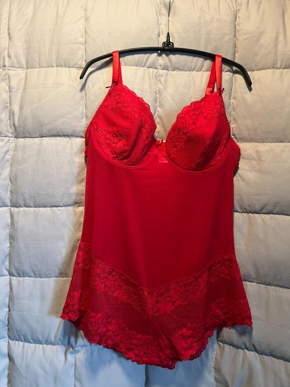 Vibrant red lingerie bodysuit, lace-trimmed